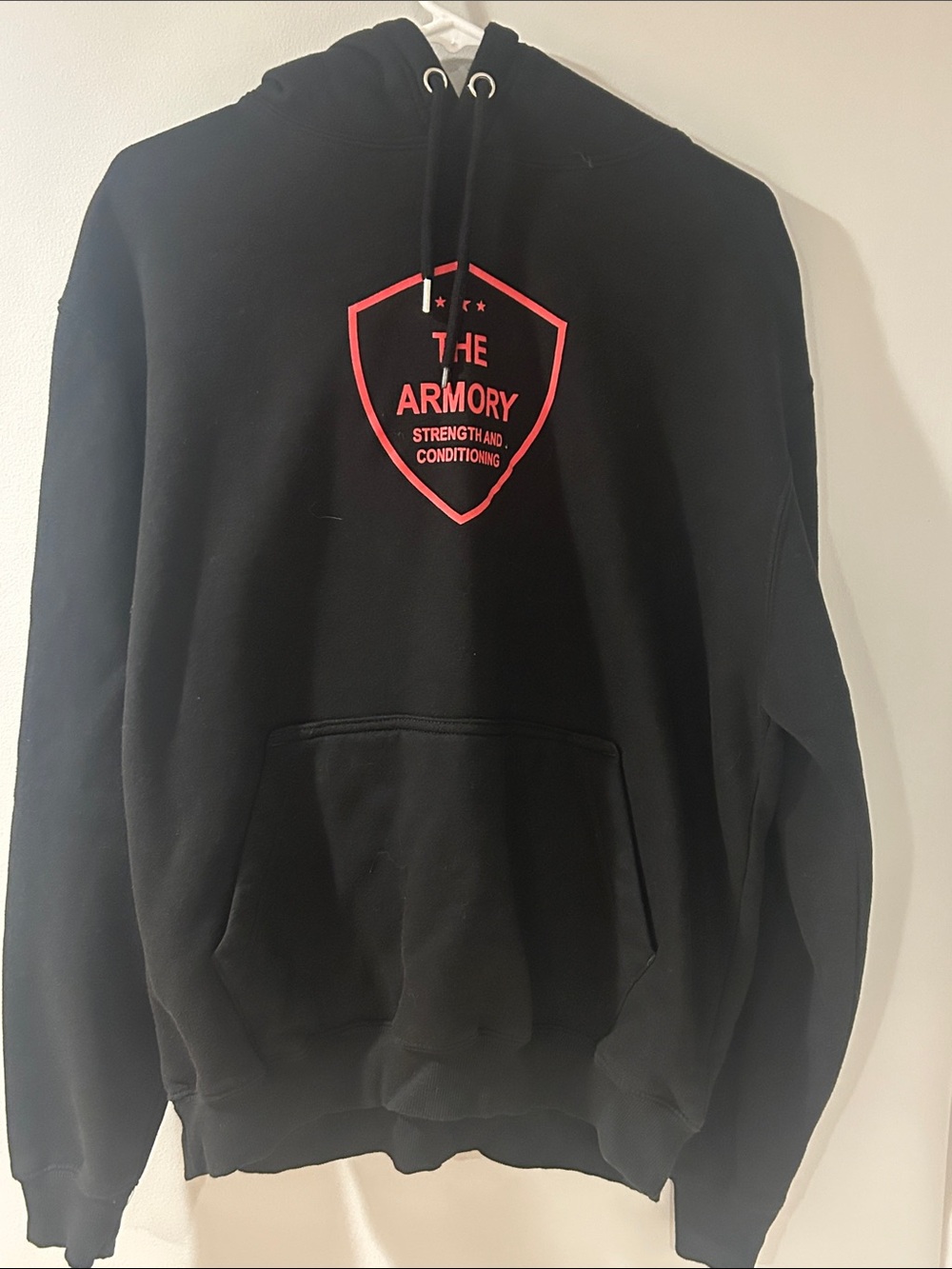 Black Crewneck Sweatshirt with Red Crest